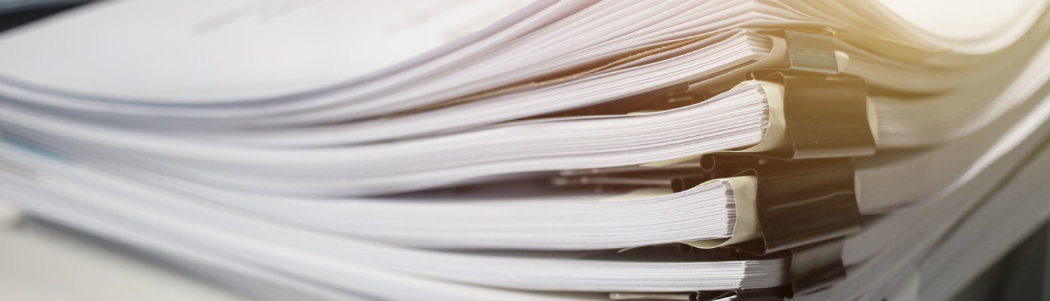 Close up view of a stack of papers Close up view of a stack of papers