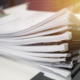 Close up view of a stack of papers