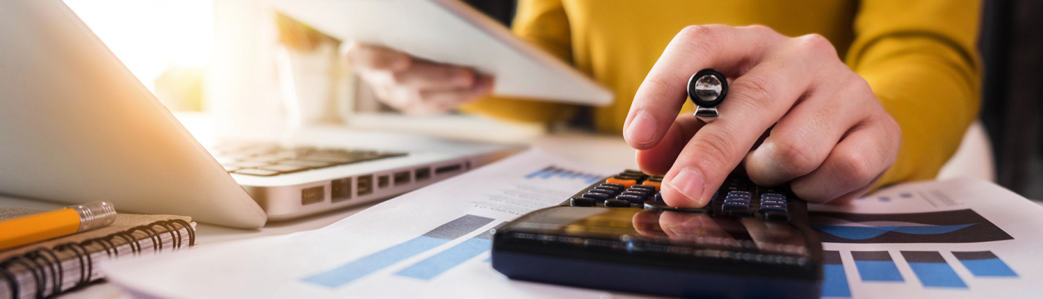 February Blog Image 2 Person Accounting Using a Calculator